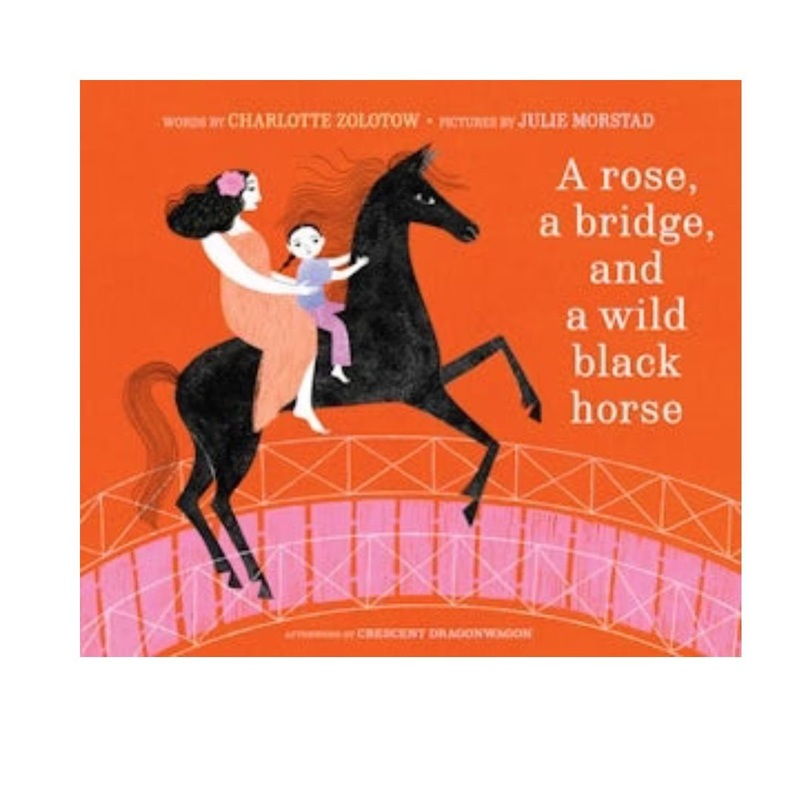 A rose, a bridge, and a wild black horse